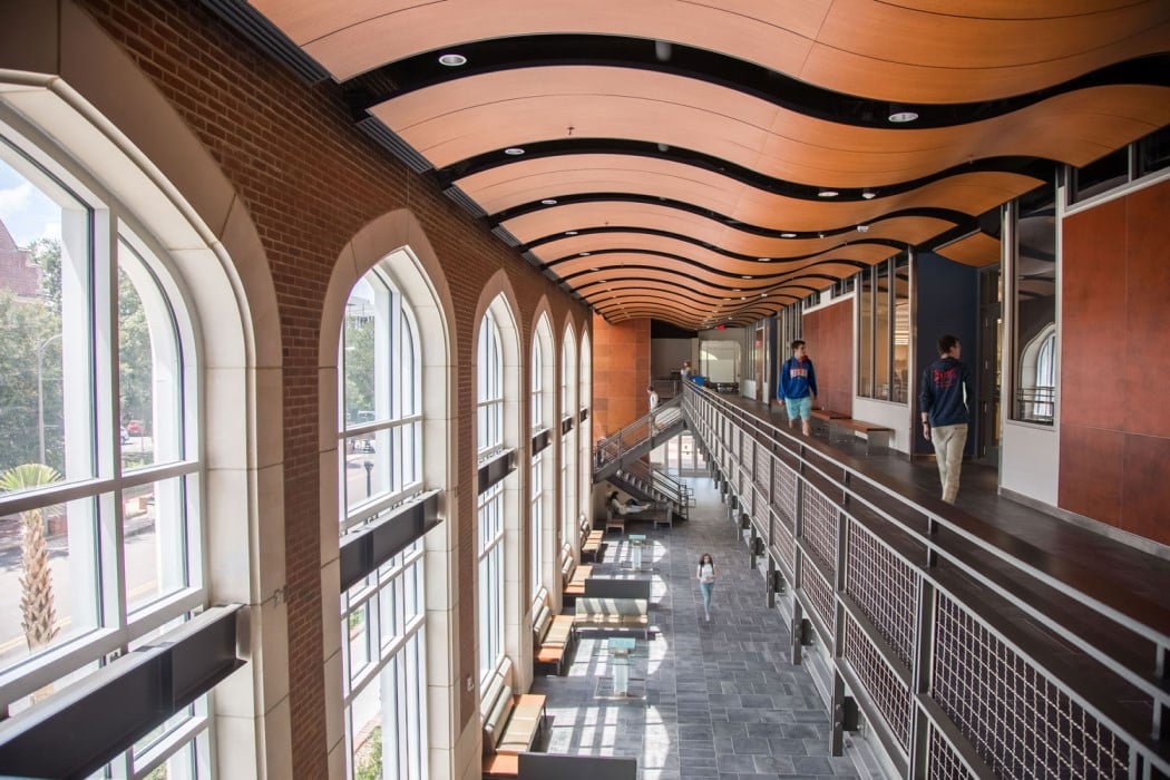 interior of second floor of chemistry building showing floor to ceiling windows and modern ceiling