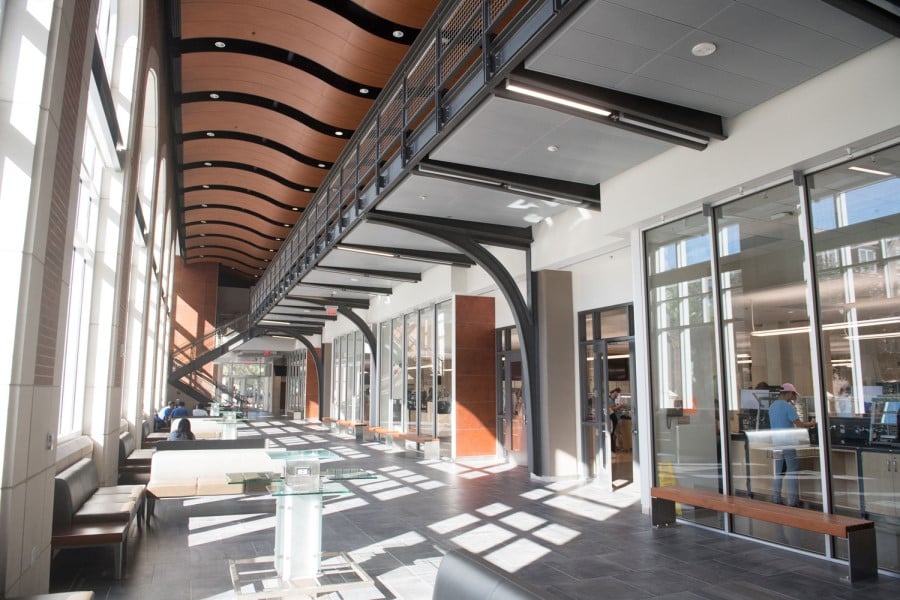 Chemistry building on the first floor hallway looking into class rooms through big glass windows