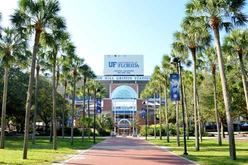 Exterior of palm-tree lined walkway to enter Ben Hill Griffin Stadium, where UF football players will line up and do the Gator Walk prior to a home football game
