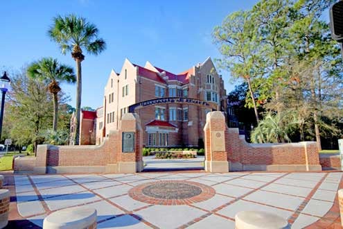 Exterior of Heavener Hall and the Heavener Archway on the UF campus
