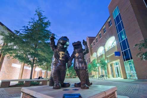 Bronze statues of Albert and Alberta mascots, located adjacent to Emerson Alumni Hall on the UF campus