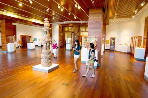 Visitors viewing the Asian gallery exhibit at the Harn Museum of Art
